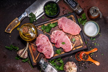 Wall Mural - Raw pork meat steaks cooking background