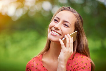 Canvas Print - So good to hear from you. a young woman talking on her cellphone outside.