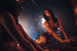 © chaossart - Young sexy woman in lingerie looking in mirror