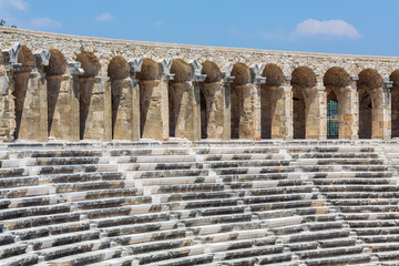 Wall Mural - Aspendos, Antalya region, Turkey (Turkiye). The columned gallery above the auditorium-theatre in the Ancient Roman Theater of Aspendos
