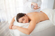 © Prostock-studio - Relaxed indian female getting salt scrub beauty treatment in the health spa