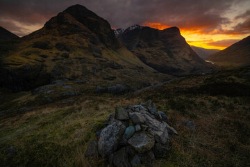 A view into Glencoe, Highlands, Scotland at sunset.