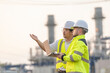© reewungjunerr - Group Asian man petrochemical engineer working at oil and gas refinery plant industry factory,The people worker man engineer work control at power plant energy industry manufacturing