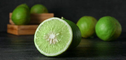 Juicy bergamot fruit on black background