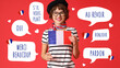 © Pixel-Shot - Pretty young woman with flag of France on red background. International French Language Day