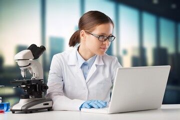 Wall Mural - Science Laboratory, Scientist work with Microscope, Doing Analysis.