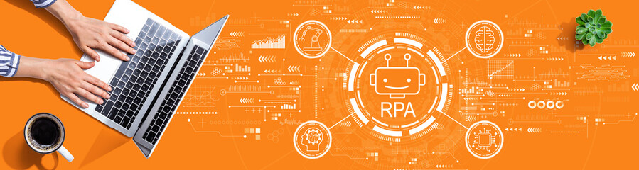 Wall Mural - robotic process automation rpa theme with person using a laptop computer