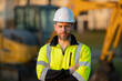 Builder on excavator. Builder worker with excavator. Builder in helmet. Worker in hardhat. Portrait mechanical worker in construction helmet. Engineer builder foreman or repairman.