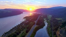 Aerial Video Captures The Beauty Of The Columbia River Gorge And Vista House-at Sunrise-golden Hour-the Camera Slowly Tracks From Left To Right-from The River To Behind The Cliffs Holding Vista House