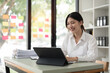 Accountant woman working on laptop and do document, tax, exchange, accounting and Financial advisor concept