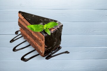 Canvas Print - Tasty sweet chocolate cake on the desk