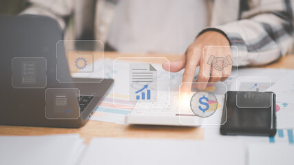 Aufkleber - small entrepreneurs calculating figures in company financial documents with a calculator,analysis of company financial data,Planning to assess and review budgets,concept of finance and investment