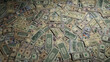 © RocknRoller Studios - Mixed Denomination Bills. Wealth concept Background with Scattered Banknotes.