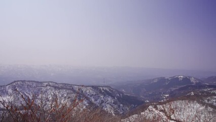 Wall Mural - 石川県金沢市にある医王山、白兀山を雪山登山している風景 Scenery of snow climbing Mt. Iozen and Mt. Shirahage in Kanazawa City, Ishikawa Prefecture, Japan.