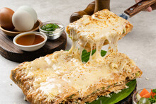Martabak Telur Is Indonesian Street Food, Made With Savory Pan Fried Pastry Stuffed With Egg, Spring Onion, Meat, Sausage, Spices And Cheese.