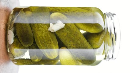 Sticker - Pickled cucumbers in glass jar. Vertical video