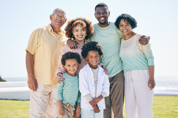 Poster - Love, smile and portrait of a happy family at a beach for travel, vacation and holiday on nature background. Relax, face and trip with children, parents and grandparents bond while traveling in Miami