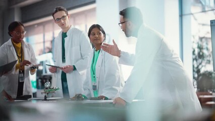 Aufkleber - International Manufacturing Project Managers Discussing Data Gathered in Product Analysis Using Laptop and Tablet Computers. Group of Young Professional Specialists Brainstorming and Solving Problems