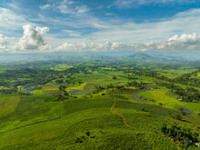 Rice Plantations And Farmland Of Farmers In A Mountain Valley. Negros, Philippines