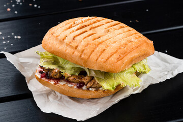 Wall Mural - Fresh sandwich with chicken, lettuce, mayonnaise and cranberry sauce.