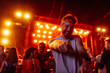 © bernardbodo - Excited young adult dancing at music festival