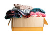 © amazing studio - Donation box with used clothes isolated on white background with clipping path to support help for poor people in the world.