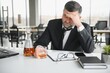 © Serhii - Old businessman drinking from stress.