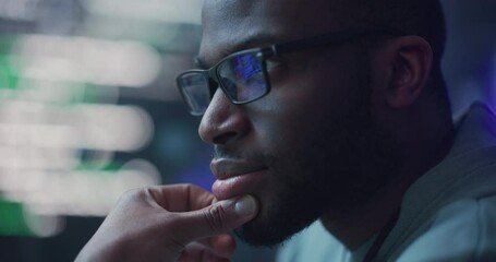 Leinwandbilder - Zoom In, Close Up Portrait of Male Programmer Developing New Software, Coding, Managing Cybersecurity Project. Black Man Working on Computer, Lines of Code Language Reflecting on his Glasses