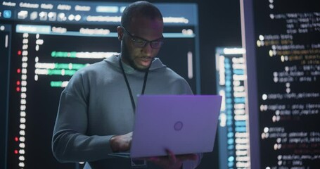 Aufkleber - Portrait of Professional Programmer Developing a Big Data Interface Software Project.Young Black Man Working on Laptop Computer, Looking at Big Digital Screen Displaying Back-end Code Lines