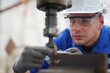© FotoArtist - worker drilling hole