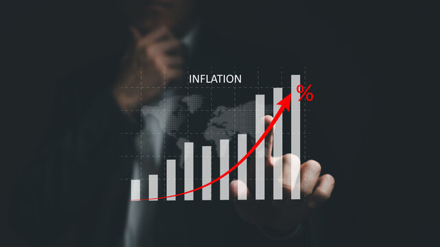 business person point at infographic graph while analyze for interest and inflation rate that have p