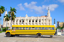 Vintage Yellow Bus Parked In The Main Square In Havana, Cuba