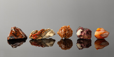 group of stones and minerals arranged in a row
