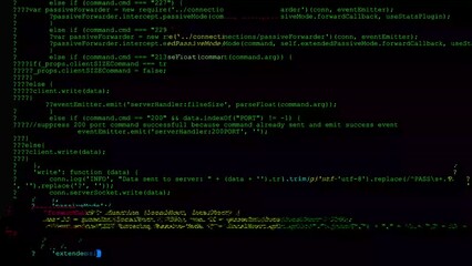 The multicoloured glitch corrupts the green lines of computer code.