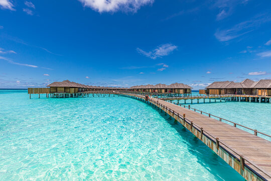 maldives paradise island. tropical aerial landscape, seascape with jetty, water bungalows villas wit