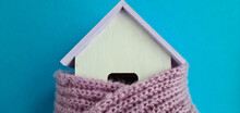 Toy Wooden House Wrapped In Warm Knitted Scarf