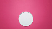 Overhead View Of Empty Plate On Pink Background