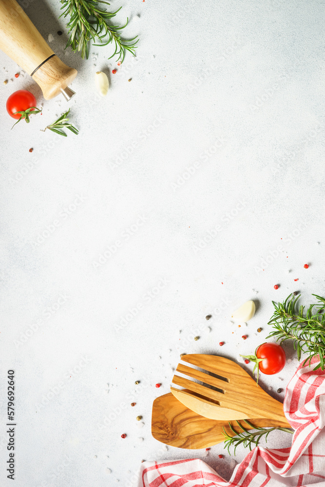Ingredients for cooking. Food background with herbs and vegetables. Top view, vertical.