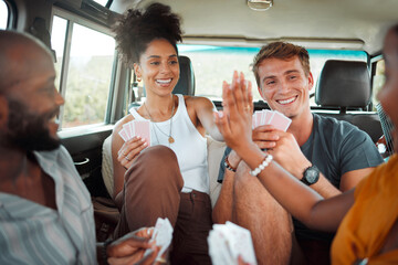 Poster - Card game, car and friends high five on a road trip enjoy holidays, vacation or fun weekend together. Winner, happy and excited girls celebrate playing, winning or victory with a smile in a caravan