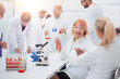 © ASDF - group of doctors and scientists work in the laboratory.
