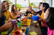 © Xavier Lorenzo - Happy young group of diverse friends having fun talking and social gathering at coffee rooftop bar - Friendship concept