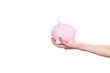 Man holding pink piggy bank isolated on white background with clipping path.