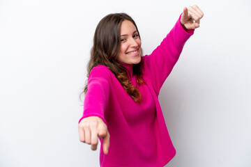 Wall Mural - Young caucasian woman isolated on white background pointing front with happy expression