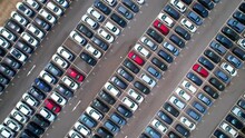 The Drone Could Capture Sweeping Panoramic Shots Of The Entire Parking Lot, Highlighting The Sheer Number Of Cars Being Produced. Automobile And Automotive Industry. Import And Export Business
