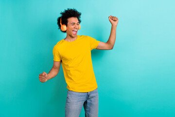 Poster - Photo of overjoyed positive man enjoy listen favorite song playlist empty space isolated on teal color background