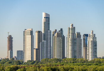 Wall Mural - Large modern apartment buildings of Puerto Madero by the shoreline in Buenos Aires Argentina