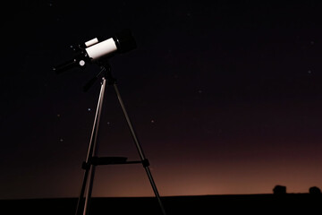 Wall Mural - New astronomy telescope outdoors, space for text. Picturesque view of shiny stars at night