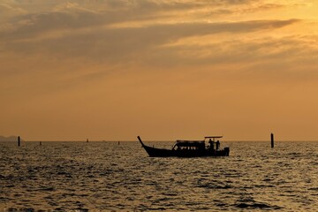 Passenger boat returning from a sunset tour