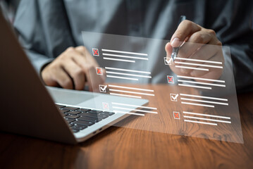 man chooses questionnaire with checkbox, survey form online, answer questions in the exam of test business checklist and filling survey form online using technology for education, learning.