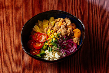 hawaiian poke bowl with chicken, vegetables, rice